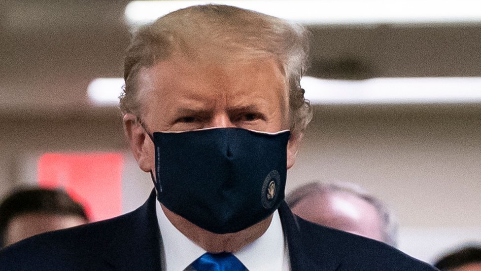 US President Donald Trump, shown at Walter Reed National Military Medical Center in Bethesda, Maryland, in July, has been reluctant to wear a mask