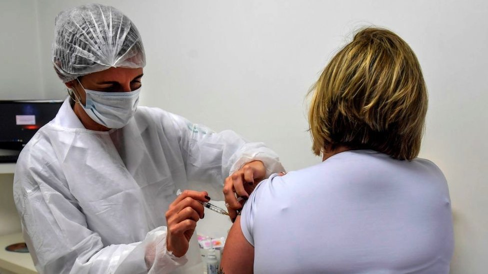 A women who is among 5,000 volunteers participating in the phase three trials in Brazil, July 2020