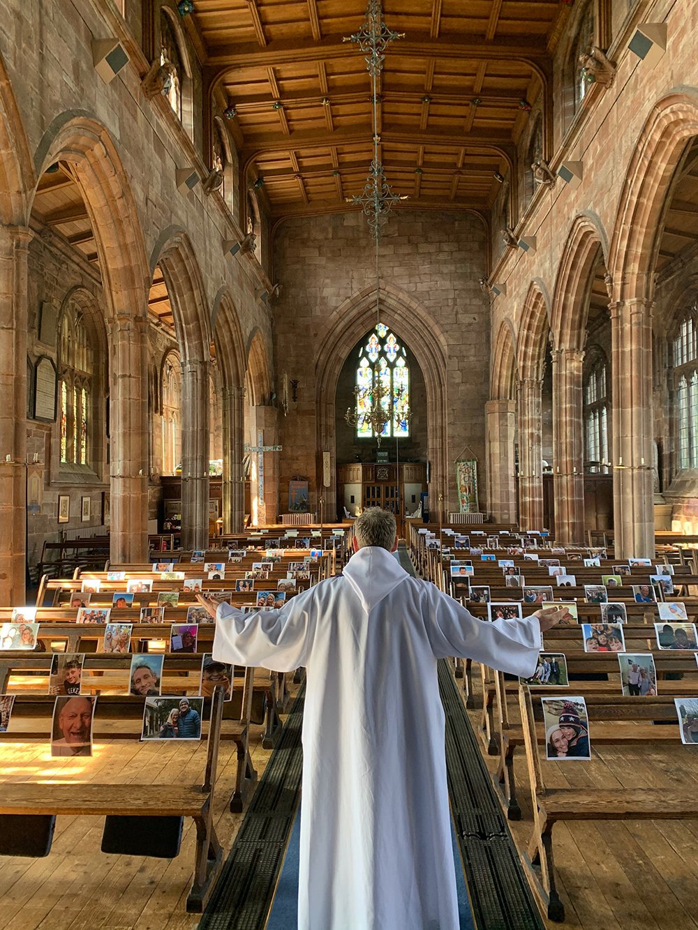 Photos arranged inside a church