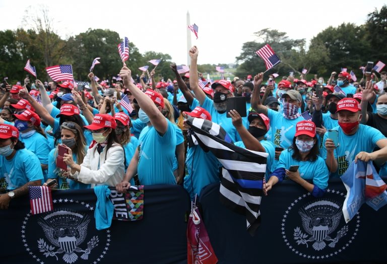 Supporters of U.S. President Donald Trump attend the president's campaign rally on the South Lawn of the White House calling it a "peaceful protest" in Washington, U.S., October 10, 2020