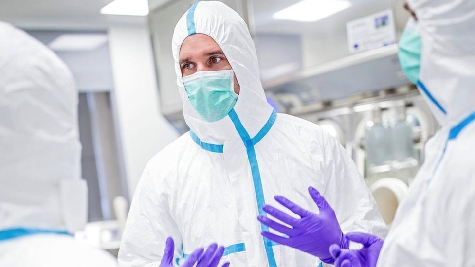 Medical staff in protective suit