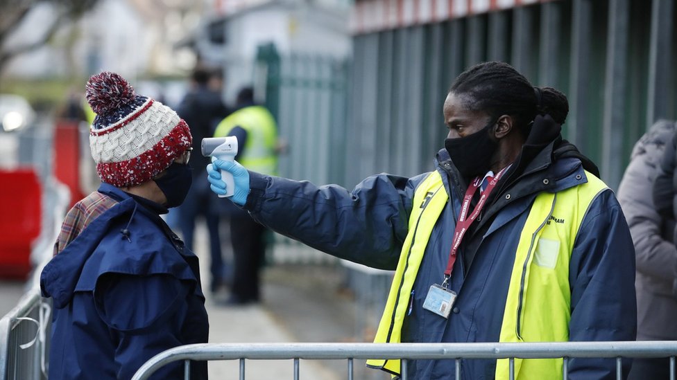 Rugby Union spectator gets temperature checked at Twickenham, London in December 2020