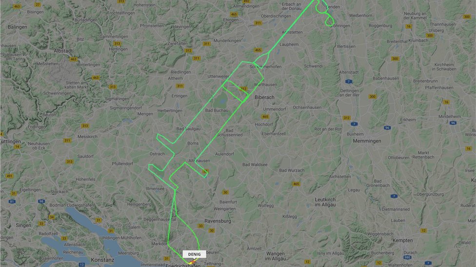 A flightradar24.com handout photo received on December 27, 2020 shows the flight track for a D-ENIG plane that traced a syringe on the maps in Germany to celebrate the arrival of a COVID-19 vaccine.