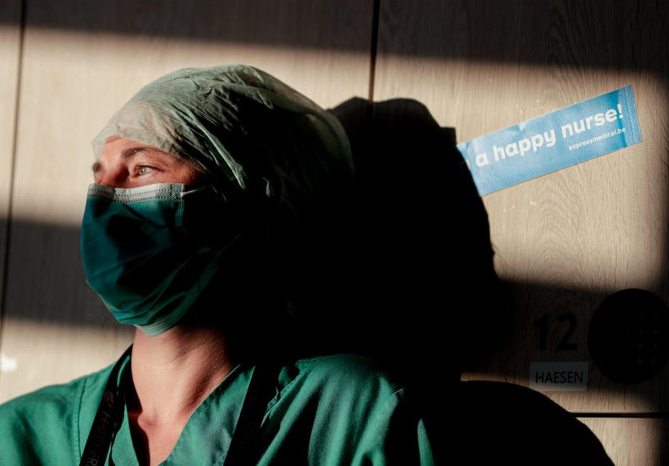 An intensive care nurse takes a break in Brussels, Belgium, 24 April 2020