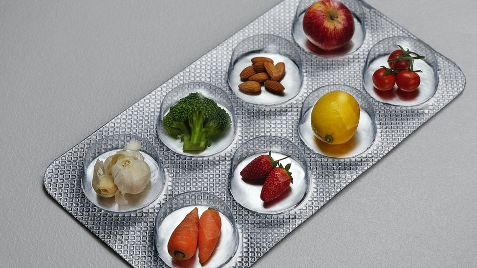 Concept image: foods in a pill blister