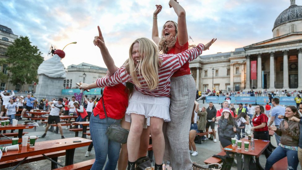 Fans celebrate in London during the European Cup