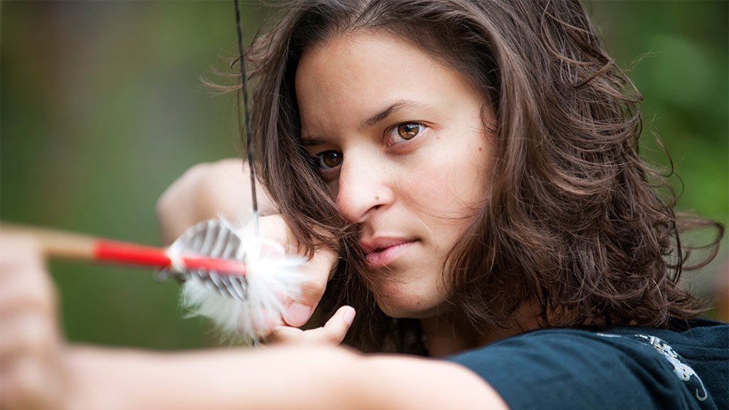 Woman shooting an arrow