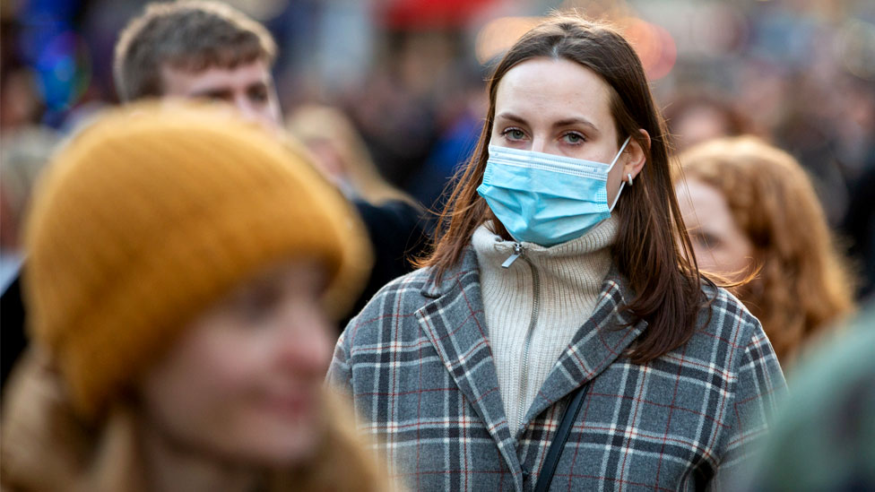 Shoppers in London on 4 December 2021