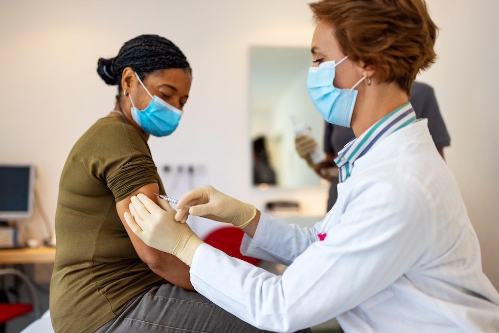 Woman getting jab